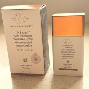 Drunk Elephant Liquid Bronzer Bottle - Bronze and White